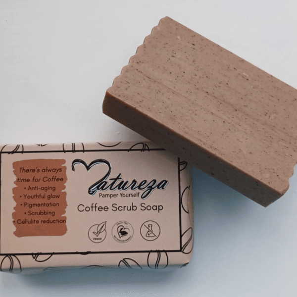 Natureza coffee scrub soap with an without packaging, displaying on the plan surface.