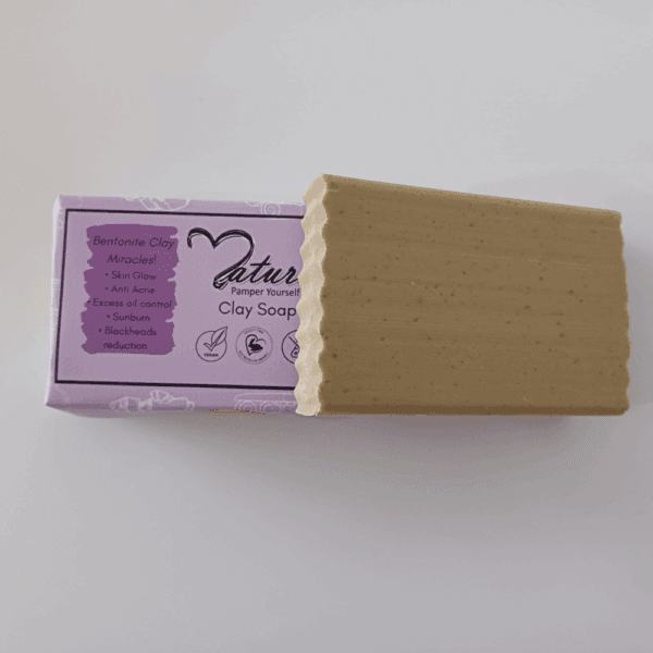 Natureza clay soap with and without packaging is one another displaying with plain background.