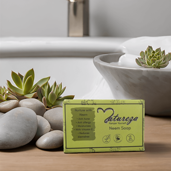 Natureza neem soap is in the bathroom settings along with cactus pots and pebbles, near the sink.